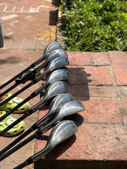 putter Nike slingshot iron set with Odyssey putter