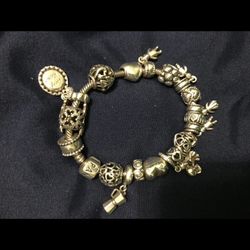 Beautiful collection Pandora bracelet with limited edition charms over 19 charms on it authentic 