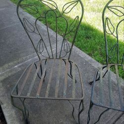Set 2 collector's metal patio chairs - $165