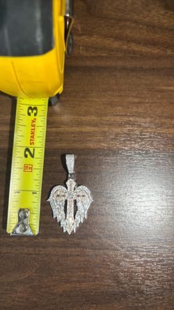 Cross and wing pendant