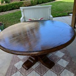 Solve a wood five foot kitchen table cancade collection , artisan collection brand new fourteen thousand my price five hundred come get it or best Off