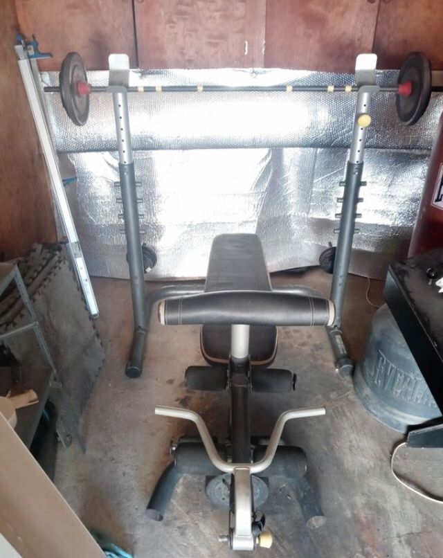 Golds gym olympic bench press squat rack bar and weights