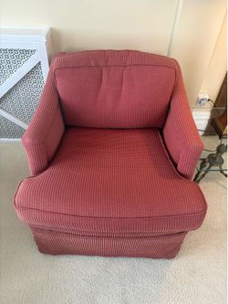 2 red sitting chairs