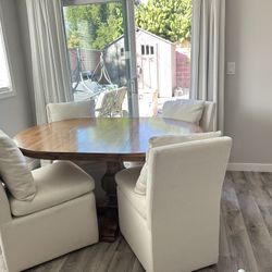 4 Upholstered Chairs With Wheels