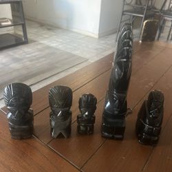vintage hand-carved black obsidian Aztec or Mayan warrior figurines