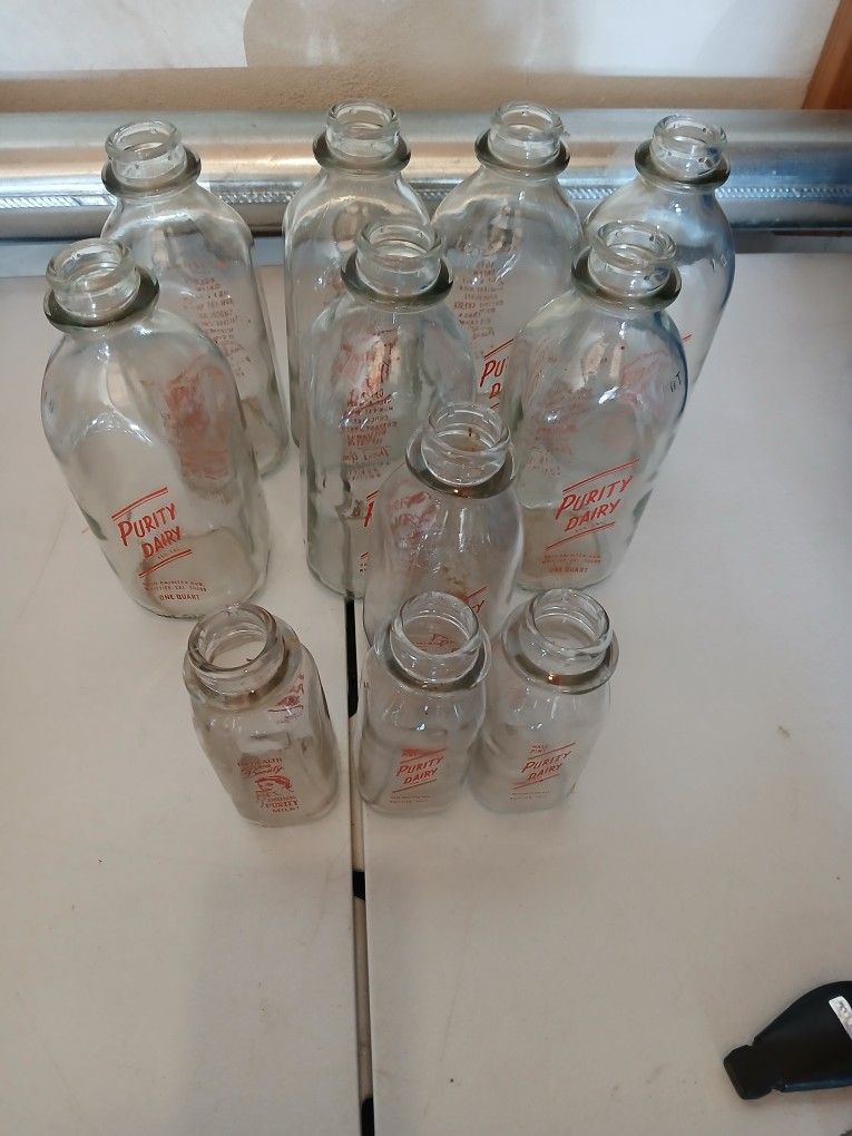 13 VINTAGE GLASS DAIRY MILK BOTTLES 