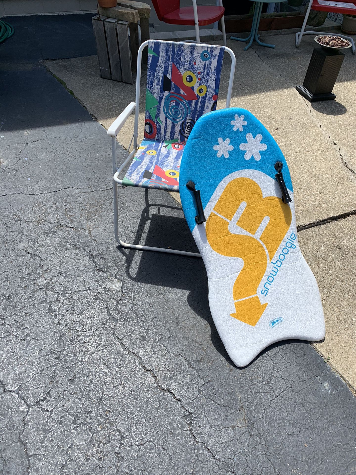 Fold up child’s chair and boogie board