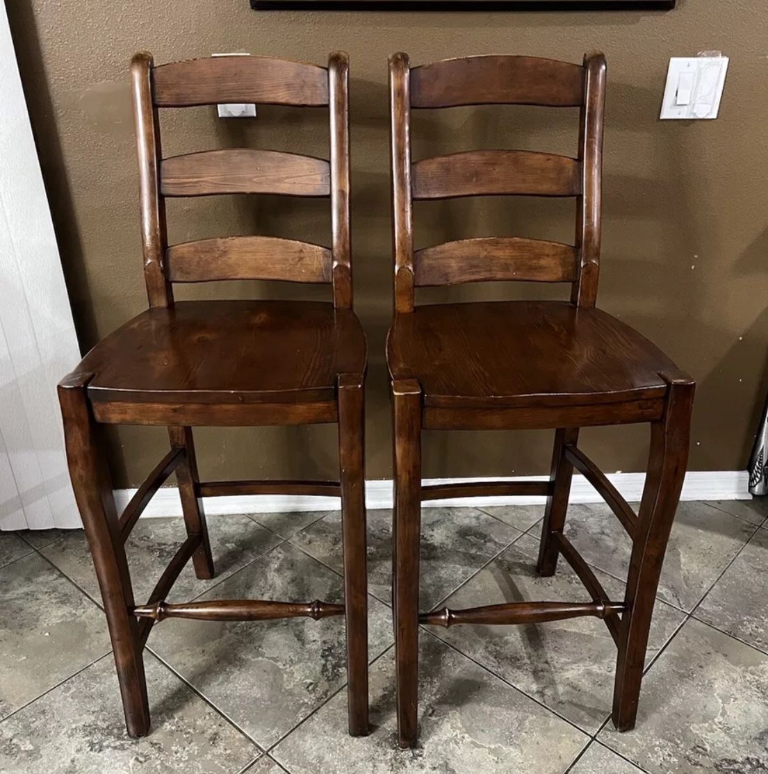 Pottery Barn Wynn Wooden Bar Stools Tall Chestnut Very Nice. Originally based on the Windsor design, the ladder-back barstool has become an American