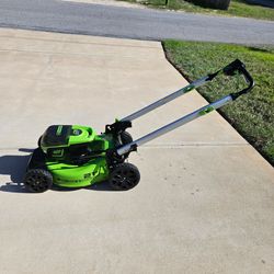 Electric lawnmower w/ two batteries and charging station