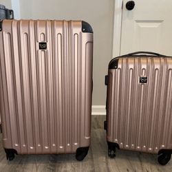 2 Traveler’s Club Midtown Hardside Spinner Suitcases