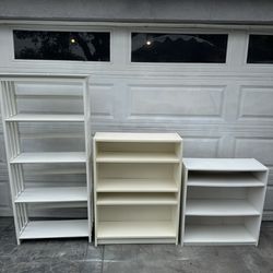 White wood tall  4-layer bookcase $75, medium 4-layer bookcase $45, 3 - layer bookcase $25 