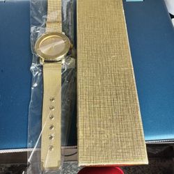 PREMIUM UNISEX QUARTZ WRISTWATCH BRAND NEW WITH BOX IN GOLD WITH AN ALL GOLD DIAL AND GOLD METAL ADJUSTABLE STRAP WITH A BRAND NEW BATTERY 