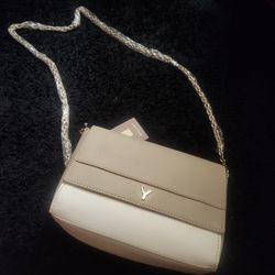 This is a Yani two-tone crossbody bag. 