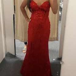 Red sequin corset dress with butterflies and slit
