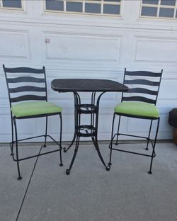 Wrought Iron Bistro Table and 2 Bar Stools