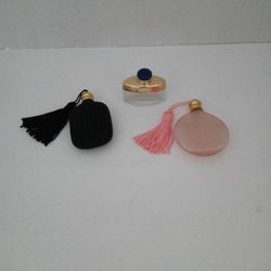 Three Tiny Perfume Bottles