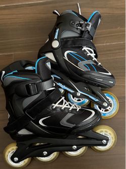 Women’s size 6, black and turquoise with white laces & Velcro buckle straps advantage pro XT blade Runner Roller blades