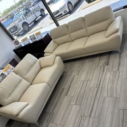 Summer clearance sale. Valencia beige leather sofa and loveseat set now $699. Easy finance option. Same day delivery.