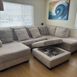 Beige Clutch And Ottomon 