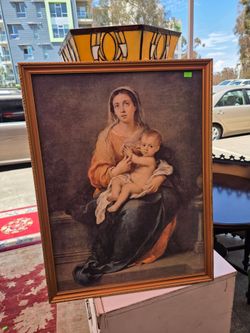 framed reproduction of the Baroque work *The Virgin and Child*