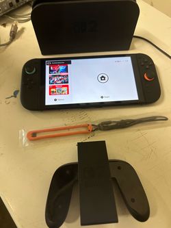 Nintendo Switch 2 with Dock and Grip and Accessories basically brand new