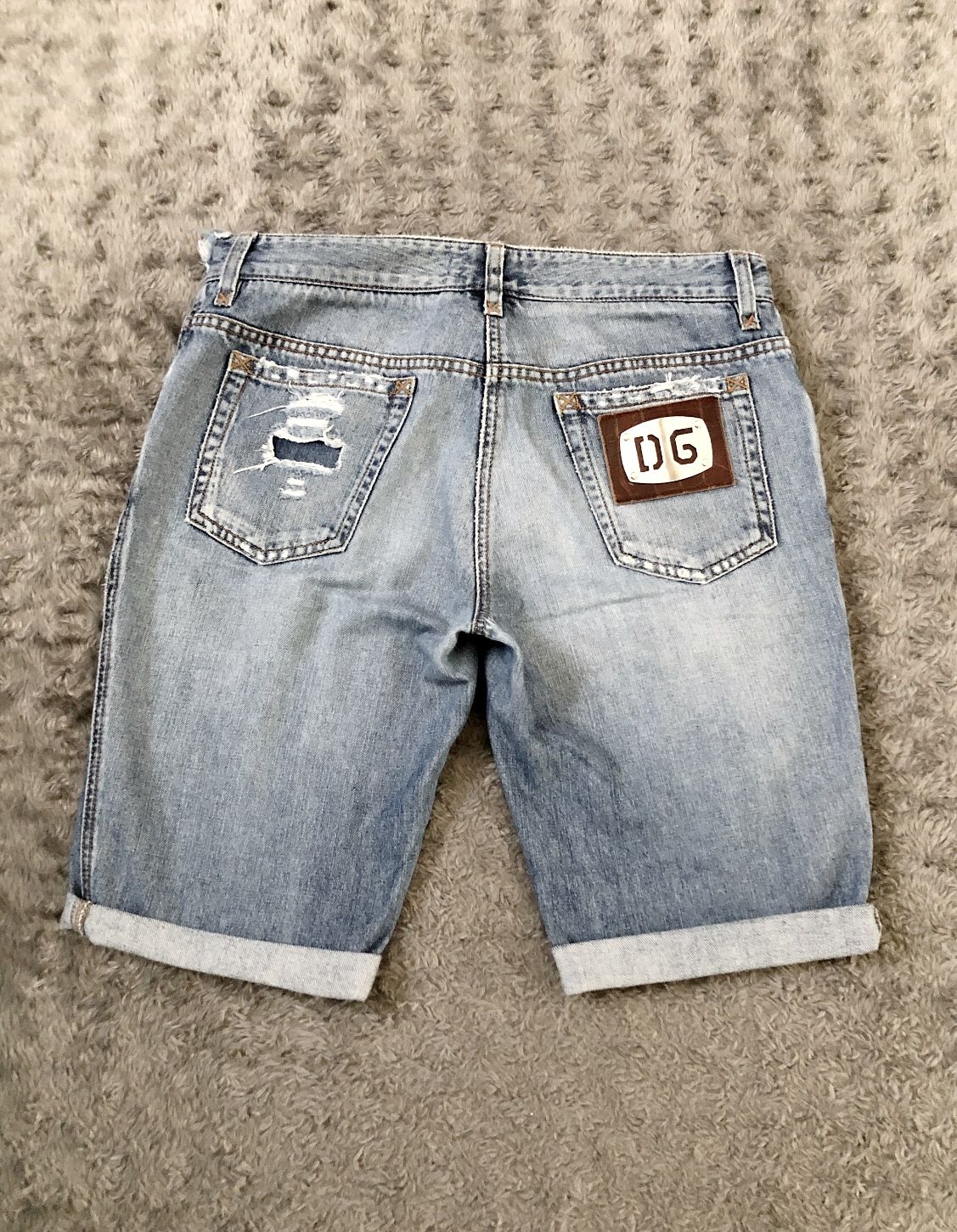 Women’s Dolce and Gabbana D&G vintage shorts size 42 retail $680 Good condition! Distressed, ripped, rolled up, washed with Metal D&G logo on back po