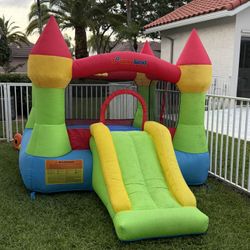 Bounceland Bounce House Castle with Basketball Hoop