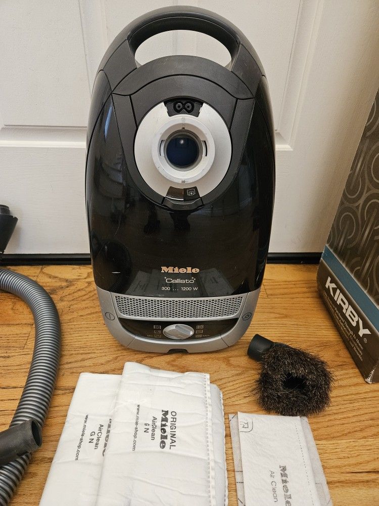 New Cond MIELE. VACUUM WITH ATTACHMENT , WORKS EXCELLENT