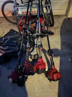 5 good brand weed wackers.  Need work.  Will run.
