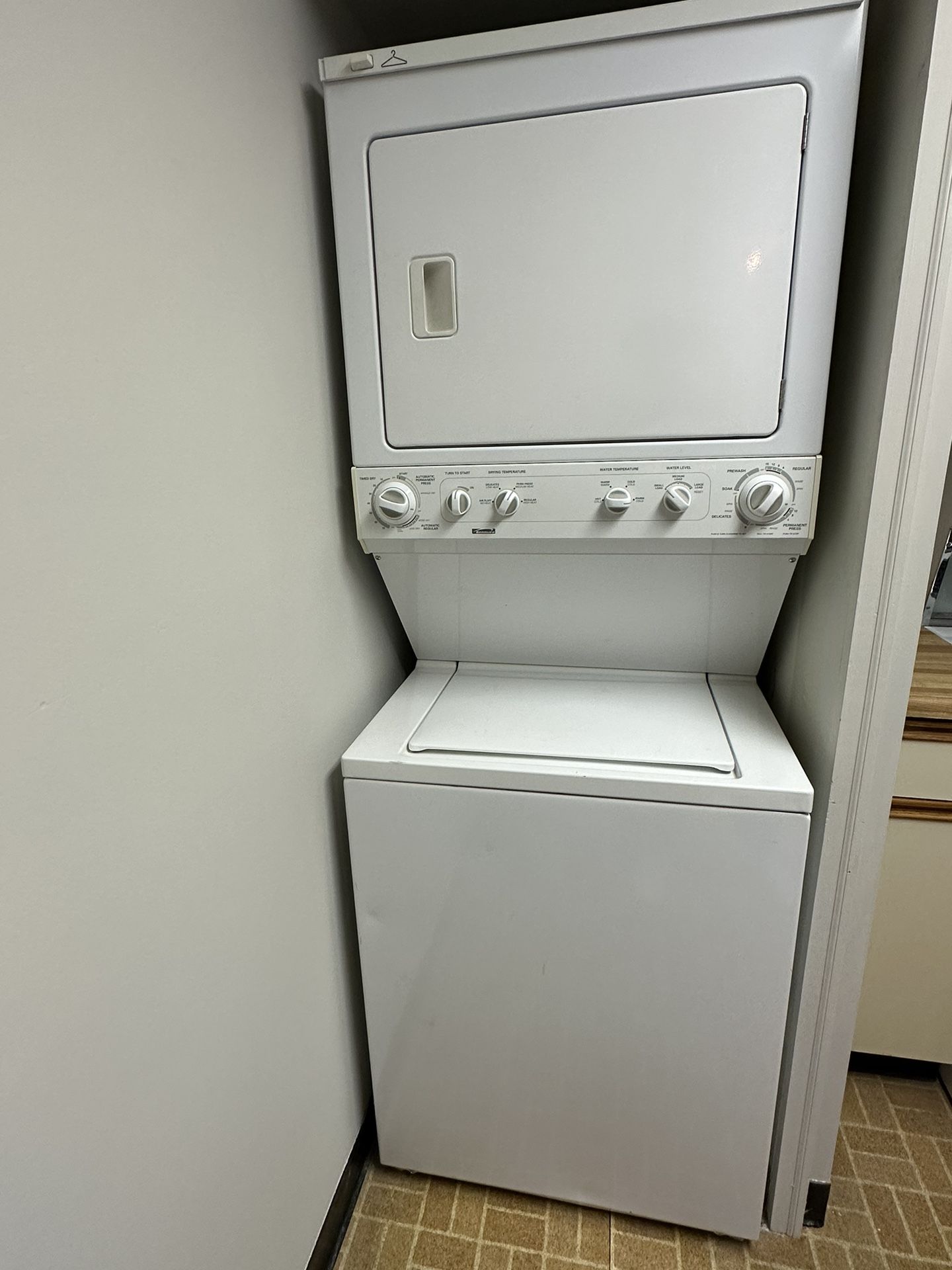 Clean, well-maintained Kenmore Stacked Washer & Dryer.
