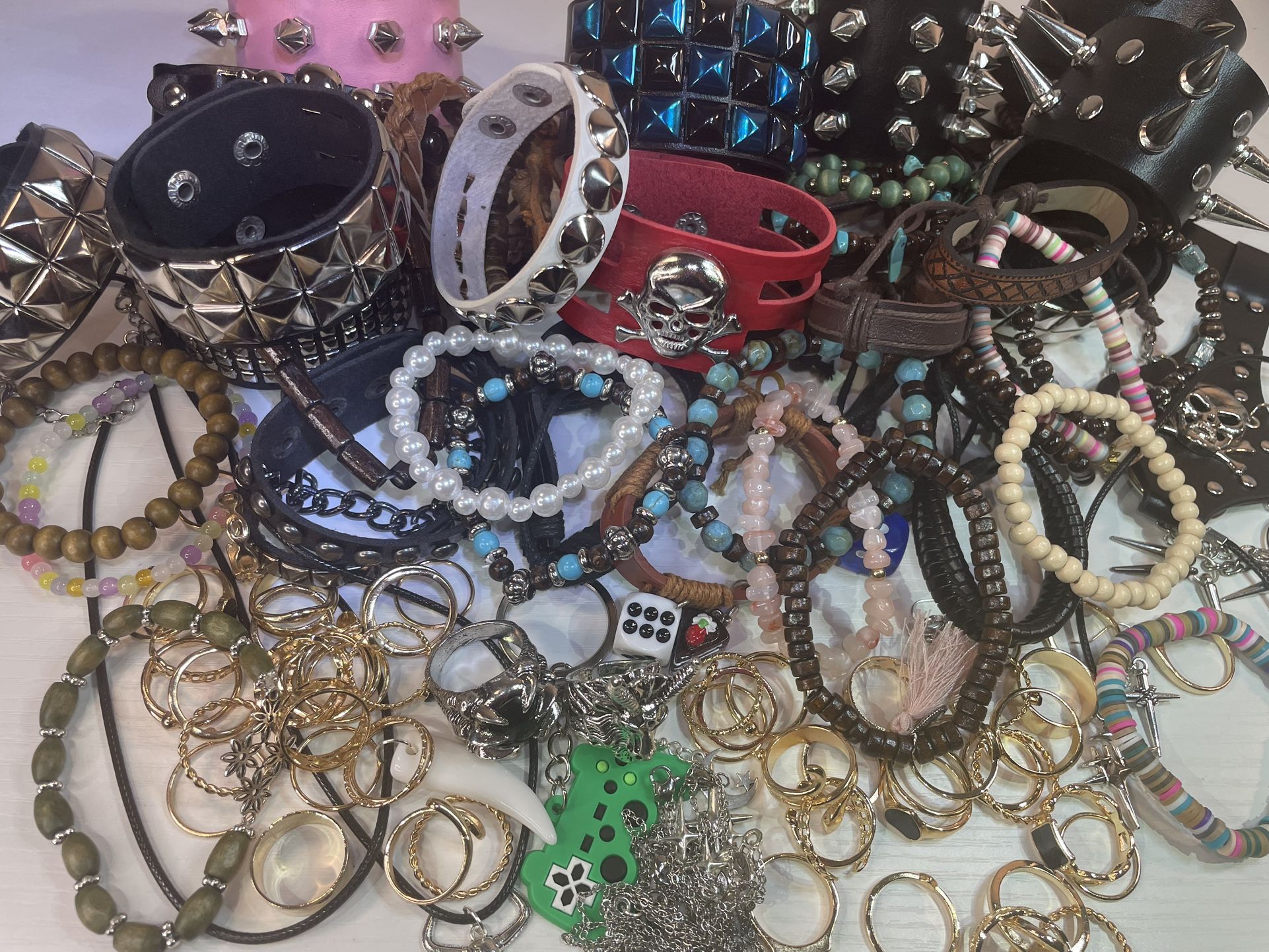 100 Pcs Of Random Gothic Jewelry Box Lot - BRAND NEW- Faux Leather Bracelets , Necklaces , Rings, Keychains , Earrings , Punk Grunge Emo Boho Tribal