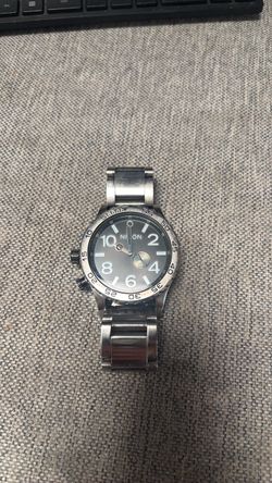 a Nixon 51-30 stainless steel quartz men's watch