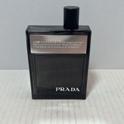 This is a bottle of Prada Amber Pour Homme Intense Eau de Parfum for men.