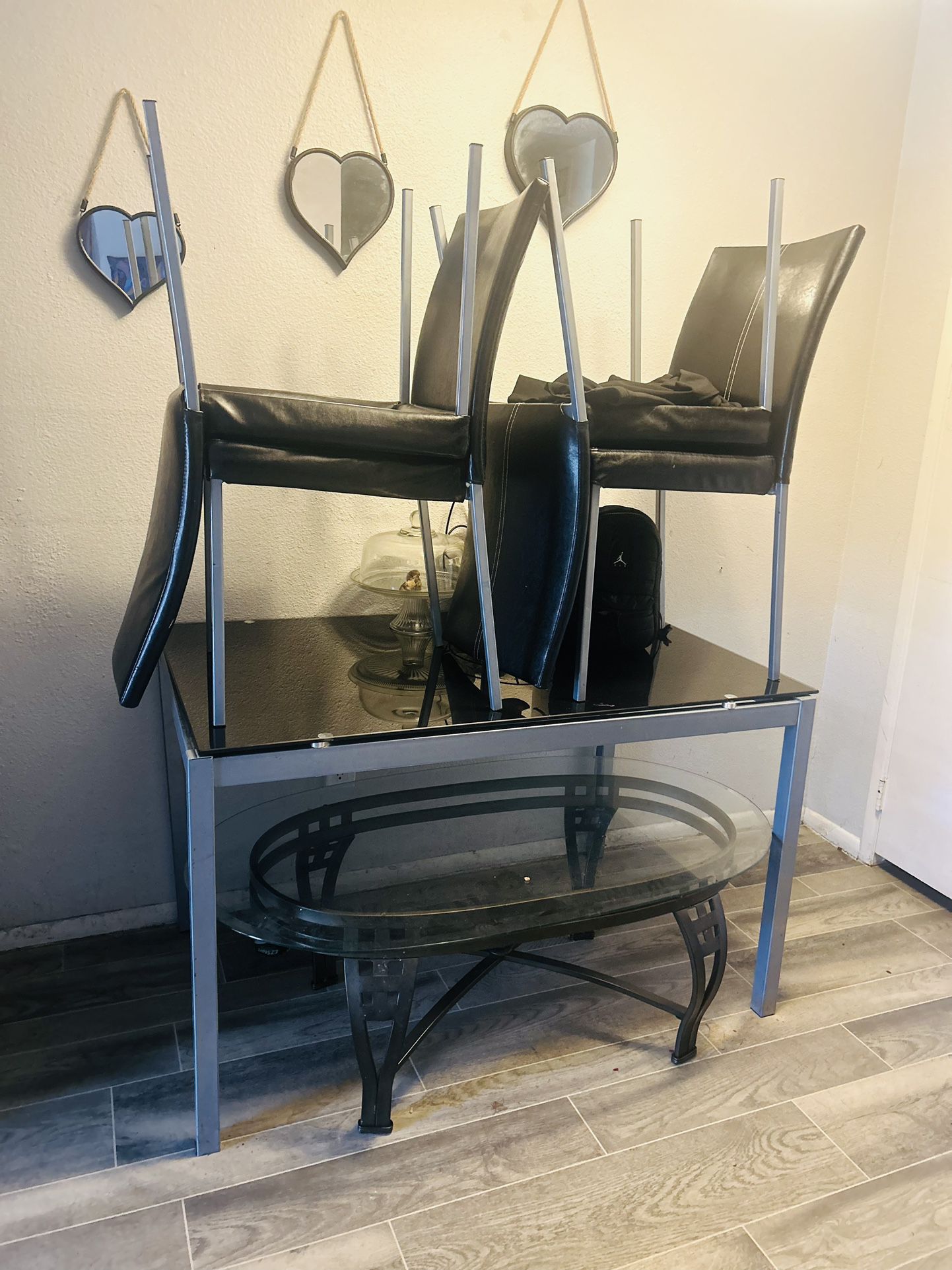 Black Tv entertainment shelf & Glass table w/4 leather chairs 
