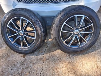 4 Aluminum  Dodge Rims with New Tires 225/65/17