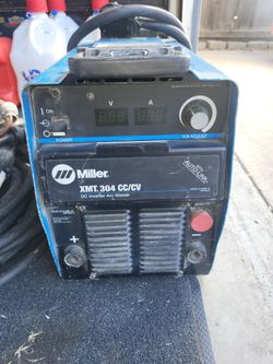 Xmt welder and 100 foot spider box cord and adapter.