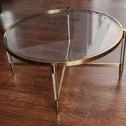Gold Round Coffee Table with Acrylic Legs, 33W, 16 H, Need To Go ASAP!