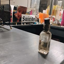 Authentic bottle with dobbler