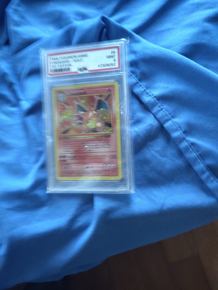 Charizard 1999 1st edition Psa 9  New
