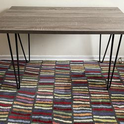 Grayish Brown Table with Wrought Iron legs