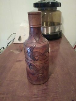 Hand carved vintage wood jug