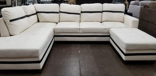 Cotemporary off white sectional with storage ottoman