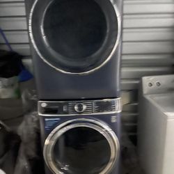 barely used stackable blue washer and dryer