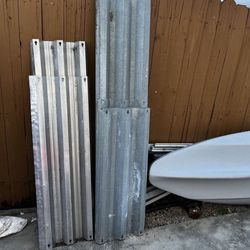 Hurricane Shutters…7 Aluminum, 12 Galvanized (ALUMINUM 1-59”/4-47”/2-48” ALL 15” WIDE) (GALVANIZED 4-71”/1-42.5”/7-40”ALL 16” WIDE)…In Good Condition…