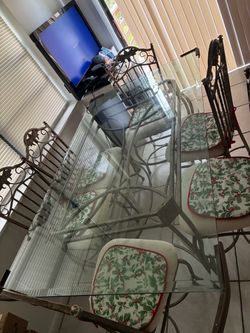 Glass table with 6 chairs