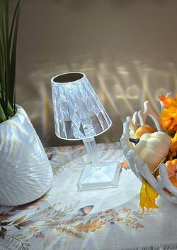 Two table lamps, very small.