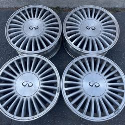 Infiniti or Nissan 15 inch Aluminum wheels and caps. 5 on 114.3mm 