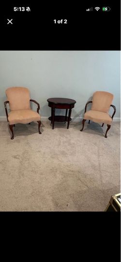 Set of two Queen Ann armchairs and side table.