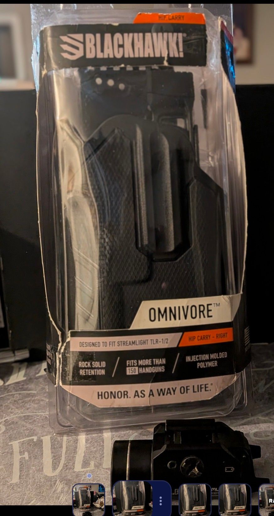 Omnivore holster (new) + one Streamlight TLR-1 light (used like new).