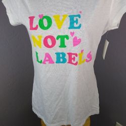 Wound Up NWT jr medium love not labels white tshirt 
60% cotton and 40% polyester

